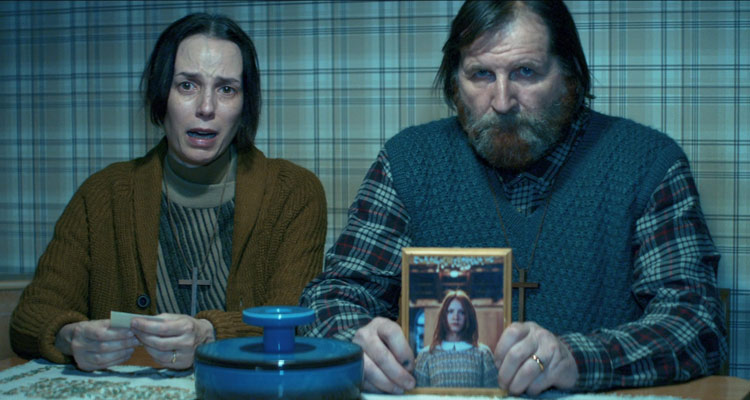 The Girl in the Fog 2017 Movie Parents holding Anna's picture