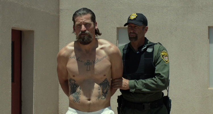 Shot Caller 2017 Movie Scene Nikolaj Coster-Waldau as Jacob in handcuffs going to a maximum security prison