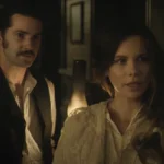 Stonehearst Asylum 2014 Movie Scene Kate Beckinsale as Eliza Graves and Jim Sturgess as Edward Newgate wandering the halls of the asylum