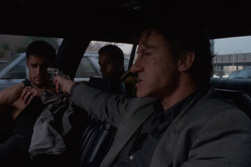 Bad Lieutenant 1992 Movie Scene Harvey Keitel as Lieutenant holding a gun to two guys he just arrested in his car