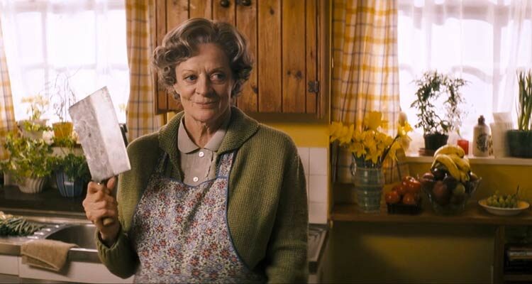 Keeping Mum 2005 Movie Scene Maggie Smith as Grace holding a meat cleaver