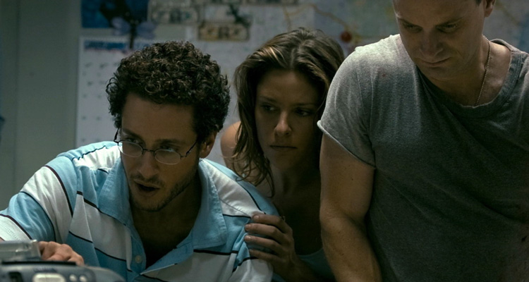 Splinter 2008 Movie Scene Paulo Costanzo as Seth, Jill Wagner as Polly and Shea Whigham as Dennis locked in a gas station