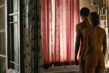 The Reader 2008 Movie Scene Kate Winslet as Hanna and David Kross as Michael standing nude next to each other in her bathroom