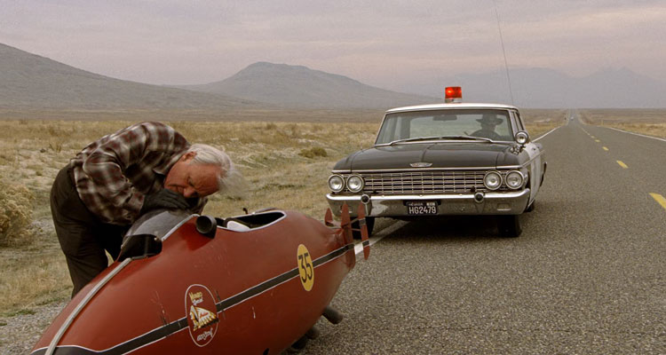 The Worlds Fastest Indian 2005 Movie Scene Anthony Hopkins as Burt Munro stopped by police while driving his 1920 Indian red motorcycle