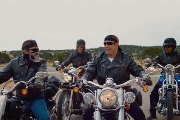 Wild Hogs 2007 Movie Scene Tim Allen as Doug, Martin Lawrence as Bobby, John Travolta as Woody and William H. Macy as Dudley arriving on their bikes at a real biker bar