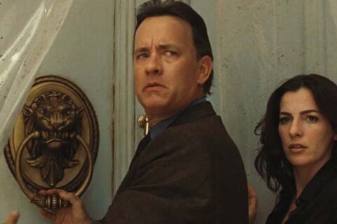 Angels and Demons 2009 Movie Scene Tom Hanks as Robert Langdon and Ayelet Zurer as Vittoria Vetra in front of a large door