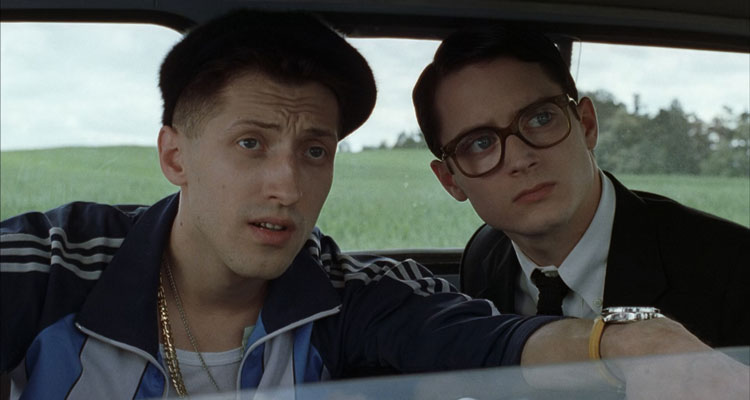 Everything Is Illuminated 2005 Movie Scene Elijah Wood as Jonathan and Eugene Hutz as Alex in the car