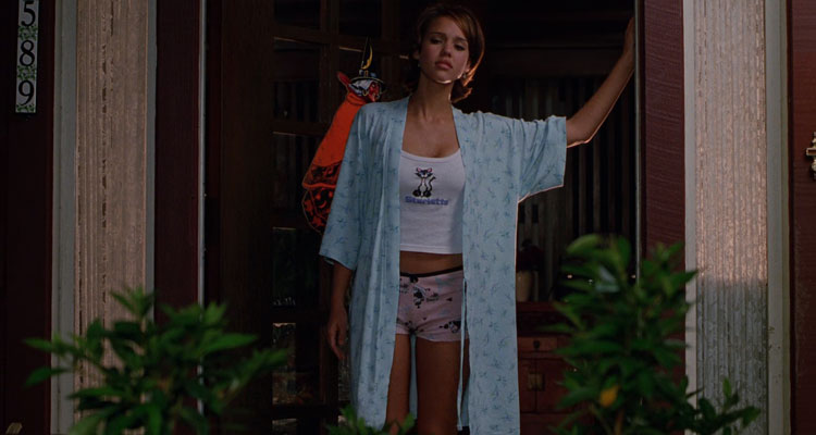 Idle Hands 1999 Movie Scene Jessica Alba as Molly at the front door of her house after hearing the bell