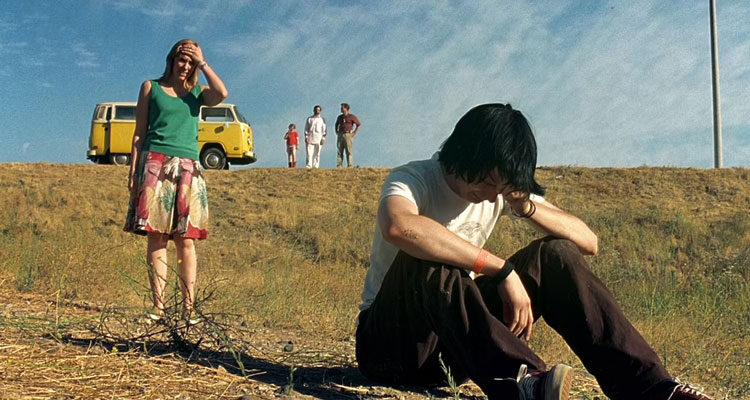 Little Miss Sunshine 2006 Movie Scene Paul Dano as Dwayne crying after running out of the van to scream with Toni Collette as Sheryl and the rest of the family in the background