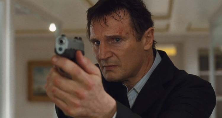 Taken 2008 Movie Scene Liam Neeson as Bryan Mills holding a gun pointed at the bad guy