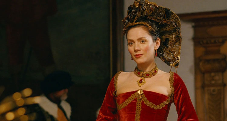 Bathory Countess Of Blood 2008 Movie Scene Anna Friel as Erzsébet Báthory wearing a red dress at the court party