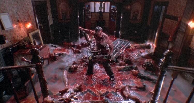 Dead Alive AKA Braindead 1992 Movie Scene Timothy Balme as Lionel standing in the middle of the bloodbath he made with his lawnmower