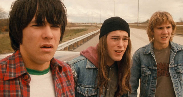 Detroit Rock City 1999 Movie Scene Giuseppe Andrews as Lex , James DeBello as Trip and Sam Huntington as Jam watching their friend getting beat up by the disco crowd on a highway