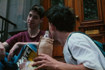 Kids 1995 Movie Scene Leo Fitzpatrick as Telly and Justin Pierce as Casper sitting in front of Telly's girlfriend building