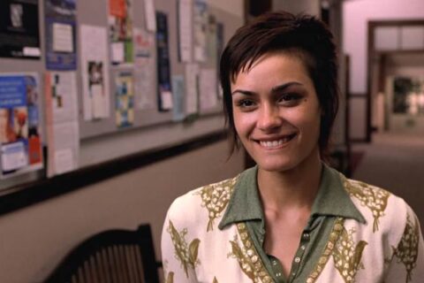 The Rules of Attraction 2002 Movie Scene Shannyn Sossamon as Lauren biting her lip and looking seductively into the camera