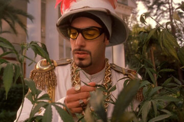 Ali G Indahouse 2002 Movie Scene Sacha Baron Cohen as Ali G touching marijuana plants in his garden