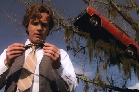 Big Fish 2003 Movie Scene Ewan McGregor as Ed Bloom holding the key with his car in a tree above him