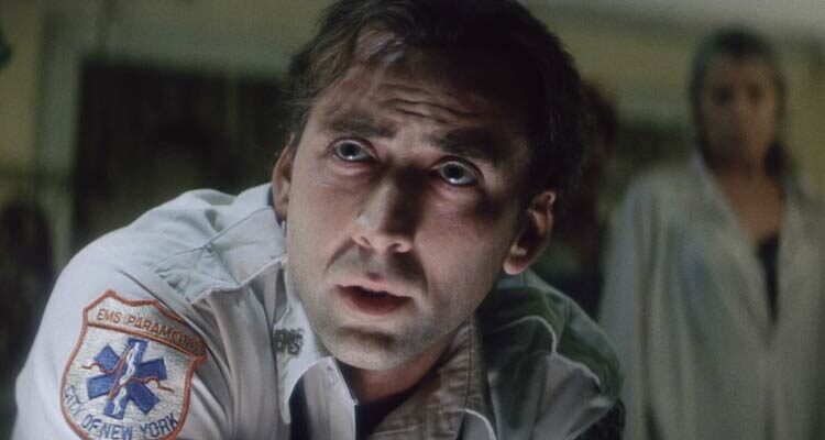 Bringing Out The Dead 1999 Movie Scene Nicolas Cage as Frank Pierce paramedic during one of his interventions