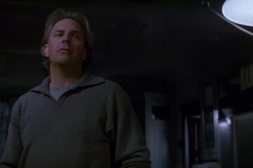 Dragonfly 2002 Movie Scene Kevin Costner as Joe Darrow hearing strange sounds in his house