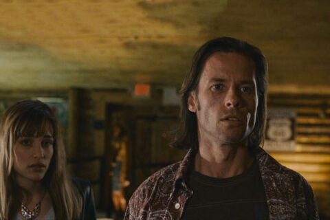 First Snow 2006 Movie Scene Guy Pearce as Jimmy Starks and Piper Perabo as Deirdre asking about fortune teller Vacaro at the local bar