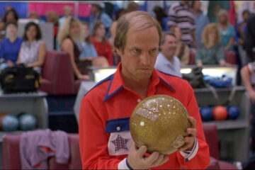 Kingpin 1996 Movie Scene Woody Harrelson as Roy Munson with a bad combover holding bowling bowl with his rubber hand