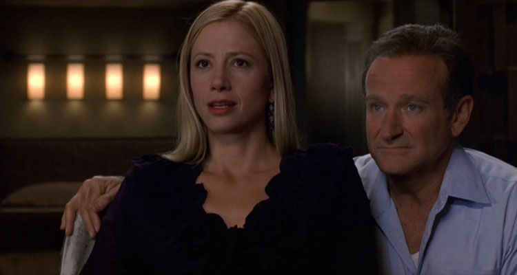 The Final Cut 2004 Movie Scene Mira Sorvino as Delila and Robin Williams as Alan Hakman looking at the footage
