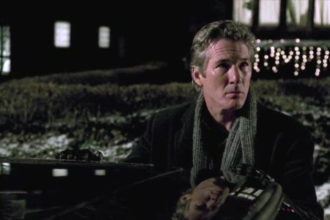 The Mothman Prophecies 2002 Movie Scene Richard Gere as John Klein standing outside his car in Point Pleasant after he has seen some strange event