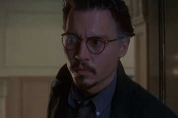 The Ninth Gate 1999 Movie Scene Johnny Depp as Dean Corso wearing glasses and looking scared