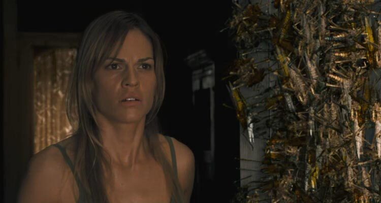 The Reaping 2007 Movie Scene Hilary Swank as Katherine walking out to find her walls covered with locusts