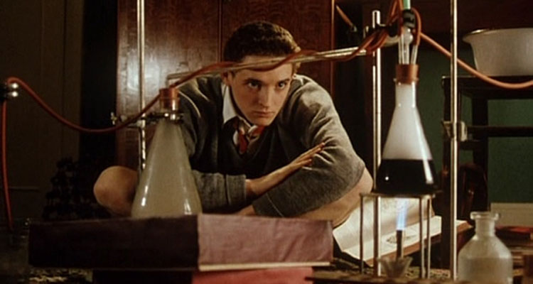 The Young Poisoners Handbook 1995 Movie Hugh O'Conor as Graham Young looking at a chemical process of distillation