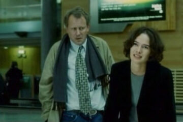 Aberdeen 2000 Movie Scene Lena Headey as Kaisa and Stellan Skarsgård as Tomas trying to board a plane