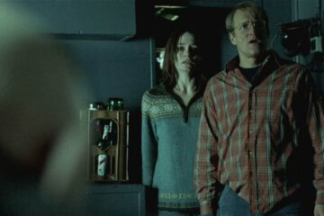 Transsiberian 2008 Movie Scene Woody Harrelson as Roy and Emily Mortimer as Jessie realizing they are in trouble onboard a train