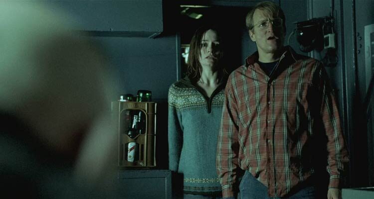 Transsiberian 2008 Movie Scene Woody Harrelson as Roy and Emily Mortimer as Jessie realizing they are in trouble onboard a train