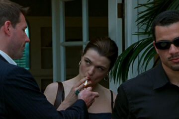 Confidence 2003 Movie Edward Burns lighting a cigarette for Rachel Weisz