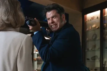 Mad City 1997 Movie Scene John Travolta as Sam holding a shotgun pointed to his former boss face