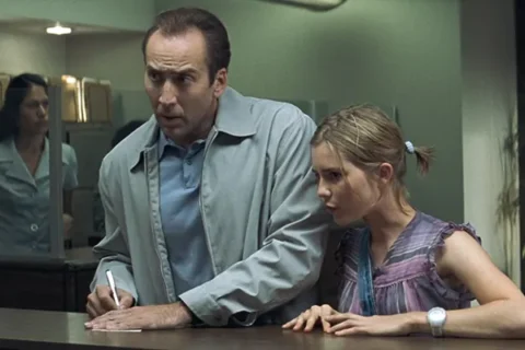 Matchstick Men 2003 Movie Scene Nicolas Cage as Roy Waller and Alison Lohman as Angela in a bank
