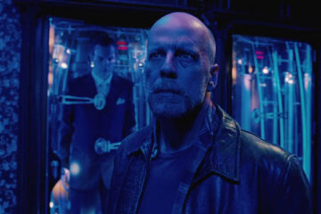 Surrogates 2009 Movie Scene Bruce Willis as Greer in a room full of androids