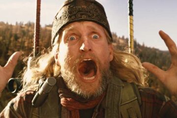 2012 Movie 2009 Scene Woody Harrelson as Charlie screaming in excitement after the eruption of the volcano