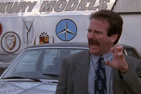 Cadillac Man Movie 1990 Scene Robin Williams as Joey in front of the car dealership
