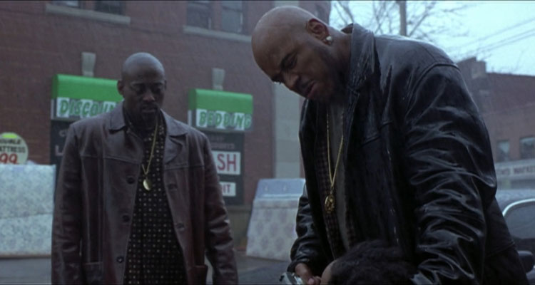 In Too Deep 1999 Movie Omar Epps and LL Cool J as God standing in the street in rain holding a gun to a head of snitch