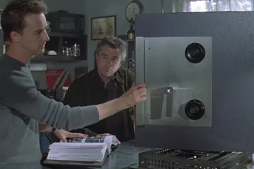 The Score 2001 Movie Scene Edward Norton as Jack and Robert De Niro as Nick practicing safe cracking