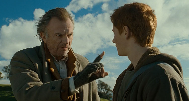 Under the Mountain 2009 Movie Scene Sam Neill as Mr. Jones talking to Tom Cameron as Theo