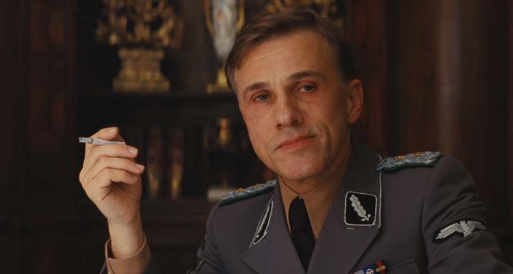 Inglourious Basterds 2009 Movie Scene Christoph Waltz as Hans Landa smoking a cigarette