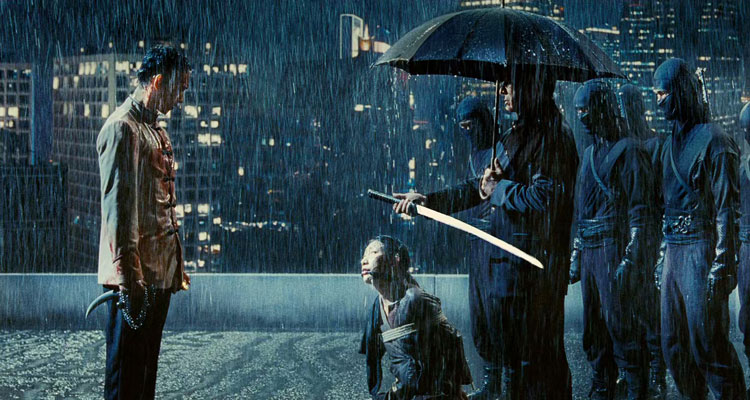 Ninja Assassin 2009 Movie Scene Sho Kosugi as Ozunu handing over the sword on top of the building
