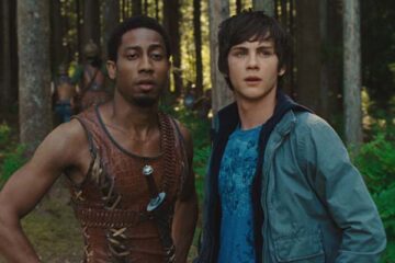 Percy Jackson the Olympians The Lightning Thief 2010 Movie Scene Logan Lerman as Percy Jackson and Brandon T. Jackson as Grover looking at centaurs running