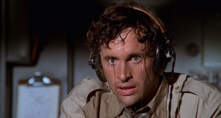 Airplane 1980 Movie Scene Robert Hays as Ted Striker as the pilot who keeps sweating profusely with water pouring everywhere
