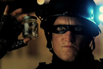 Defendor 2009 Movie Scene Woody Harrelson as Defendor holding a jar full of angry wasps