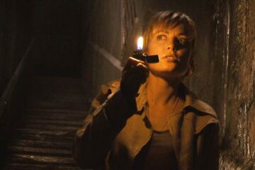 Silent Hill 2006 Movie Scene Radha Mitchell as Rose Da Silva using a lighter to see into the dark basement beneath the city
