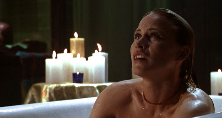 Stigmata 1999 Movie Scene Patricia Arquette as Frankie taking a bath when something attacks her