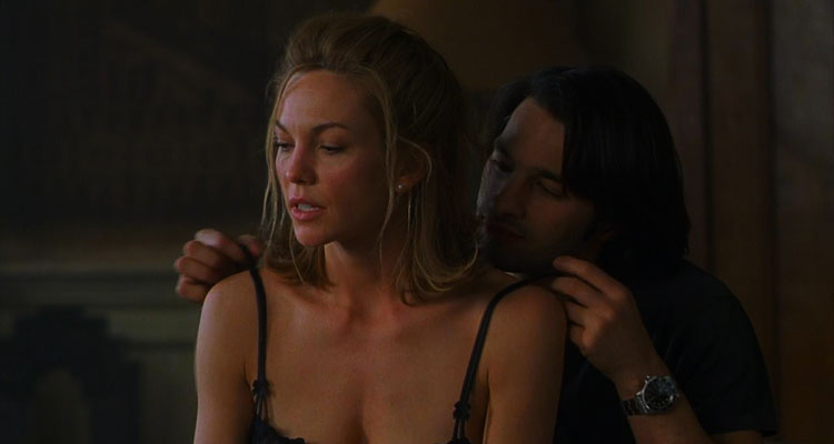 Unfaithful 2002 Movie Diane Lane and Olivier Martinez in his studio as he's taking of her bra and proceeds to make love to her scene